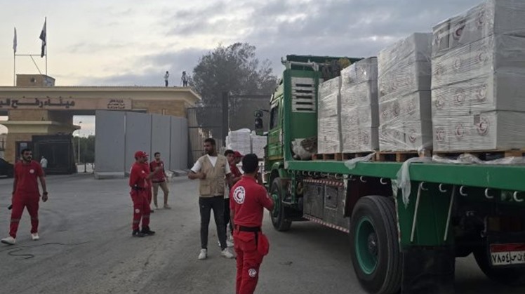 Aid convoys on their way to Gaza from North Sinai