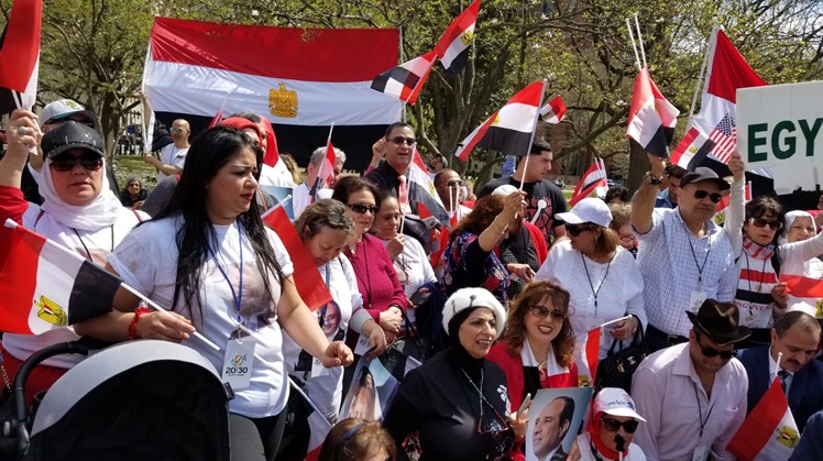 A number of the Egyptian expatriates in the U.S. gathered in front of the Congress holding flags to express  welcomeness of President Abdel Fatah al-Sisi who will start a state visit on Tuesday. 

