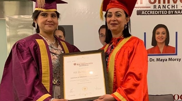 Dr. Maya Morsi receiving her honorary doctoral degree at the gala inaugural of the Women Economic Forum 2019 (Press photo)
