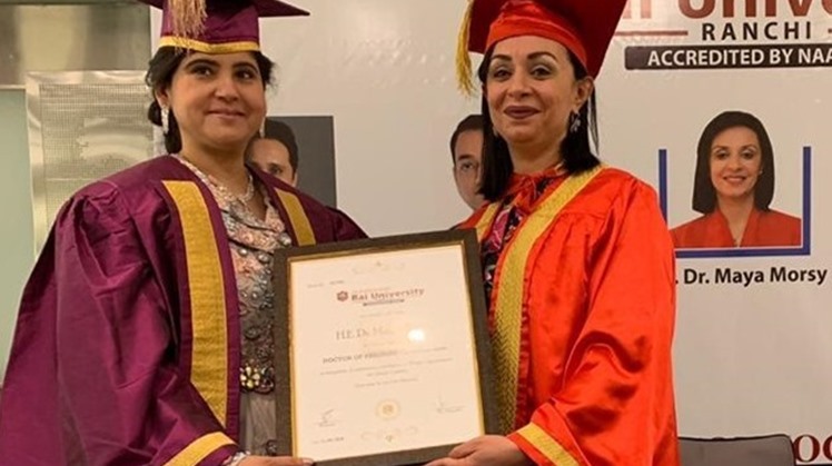 Dr. Maya Morsi receiving her honorary doctoral degree at the gala inaugural of the Women Economic Forum 2019 (Press photo)
